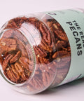 Orzechy Pecan BIO 400g - spód szklanego słoika - Ekogram